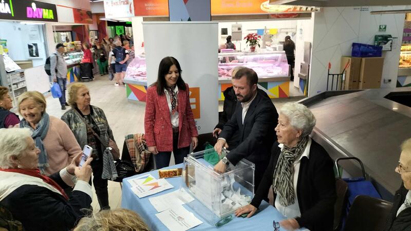 Acción para promocionar compras en el mercado municipal