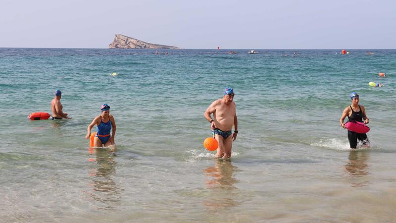 Nearly 400 Swimmers take Part in the ‘Heartbreak Benidorm Crossing,’ swimming along Levante Beach to the rhythm of rock and roll