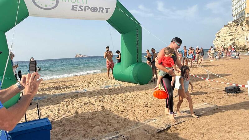 Nearly 400 Swimmers take Part in the ‘Heartbreak Benidorm Crossing,’ swimming along Levante Beach to the rhythm of rock and roll